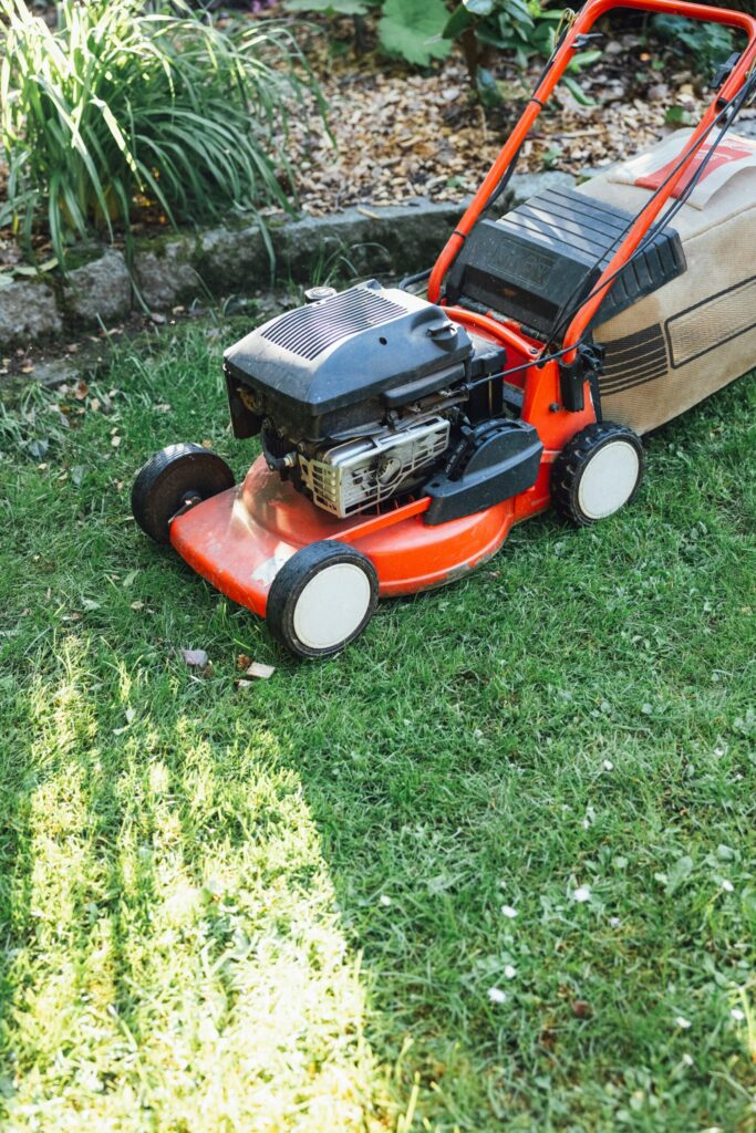 Grass cutting Swindon – Lawn mower in action for professional grass cutting.